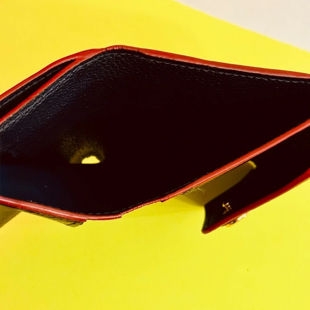 Louis Vuitton Black Embossed Monogram Compact Wallet with Red Trim